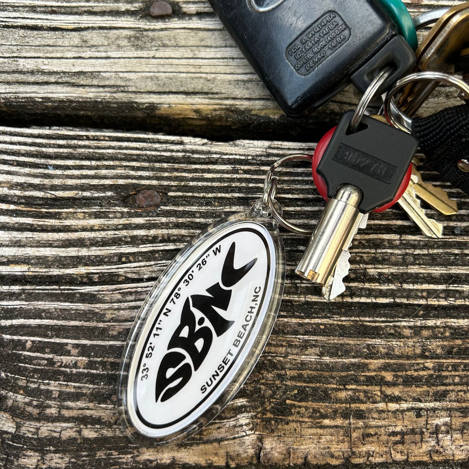 SBNC FISH LATLONG OVAL KEYRING