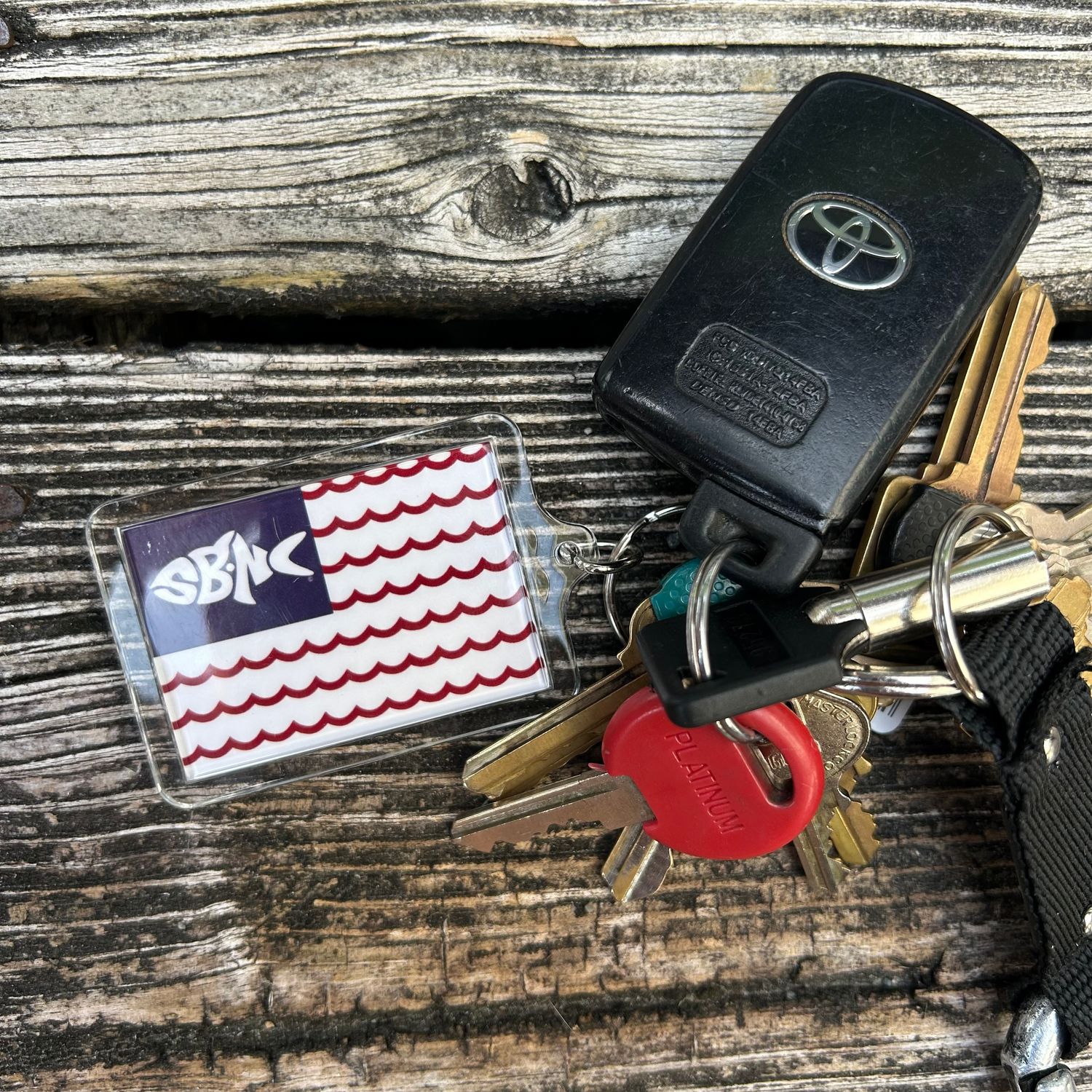 SBNC FISH WAVES FLAG KEYRING