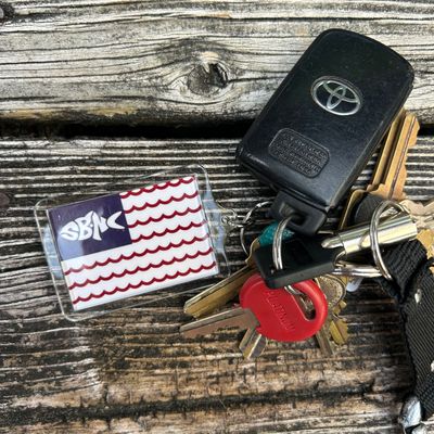 SBNC FISH WAVES FLAG KEYRING