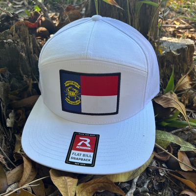 SBNC CRAB NC FLAG PATCH 7-PANEL CAP WHITE/WHITE 168 SBNC CRAB NC FLAG PATCH 7-PANEL CAP WHITE/WHITE 168