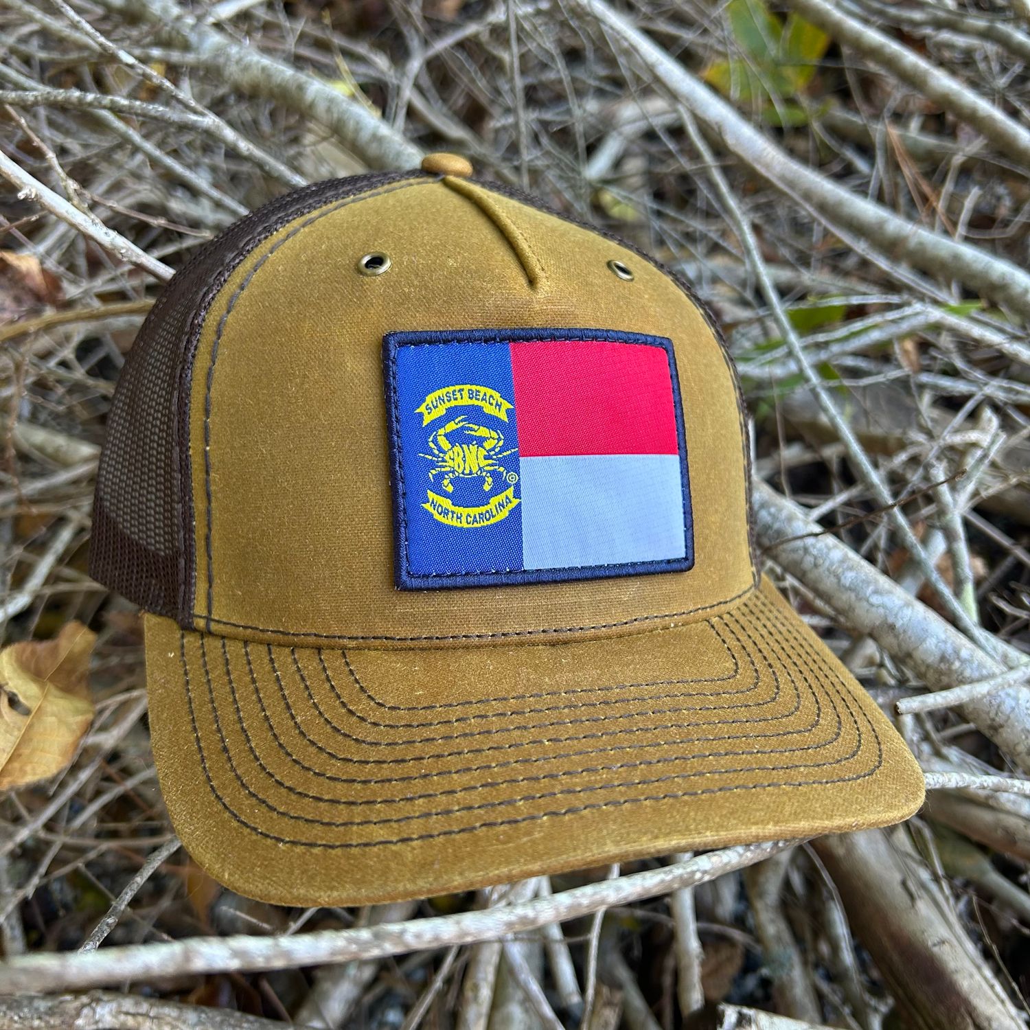 SBNC CRAB NC FLAG PATCH CAP WHSKY/BROWN 112-WAXED