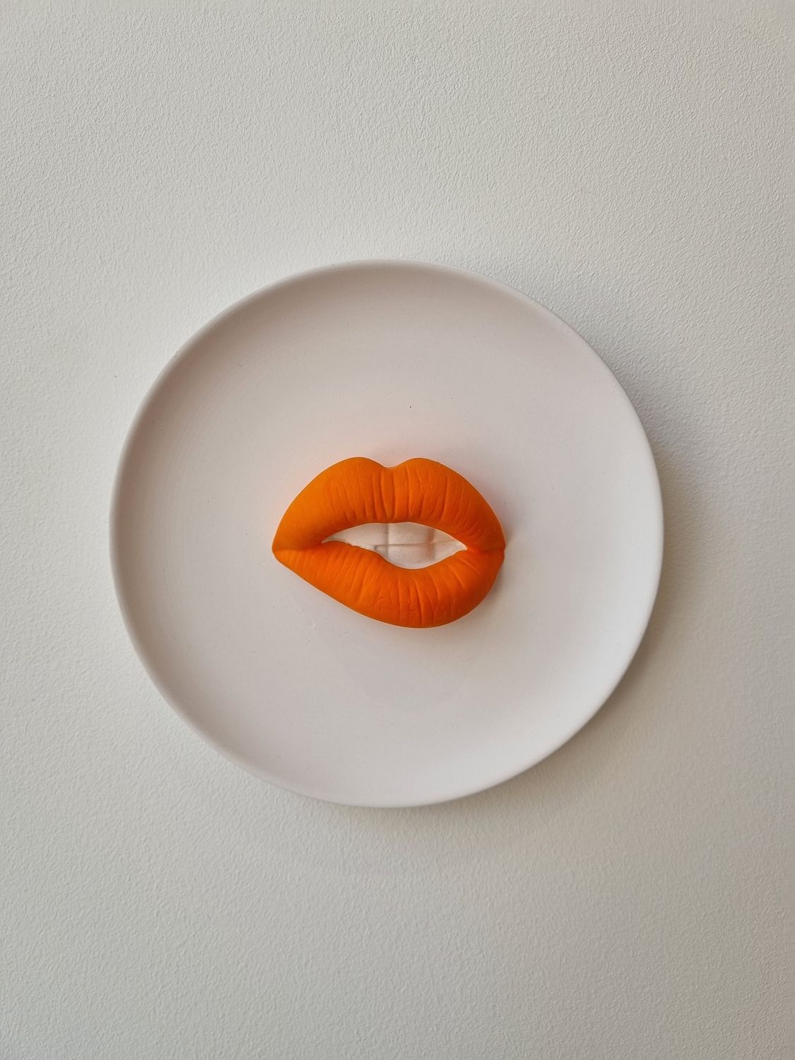 Wandbordje lippen oranje