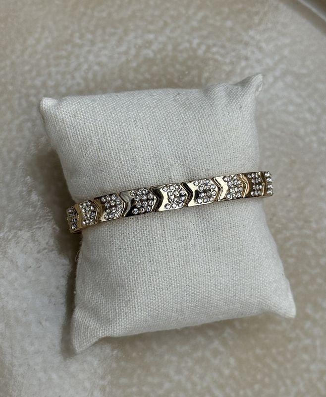 Armband goud pijl strass 37