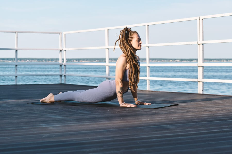 Woman Exercising Hot Yoga