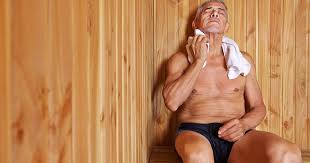 men sweating in sauna
