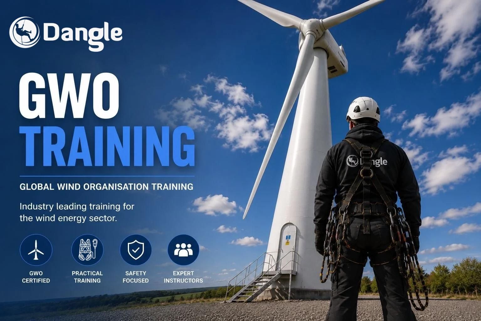 Wind industry technician standing at the base of a wind turbine during GWO training with Dangle Academy in Belfast