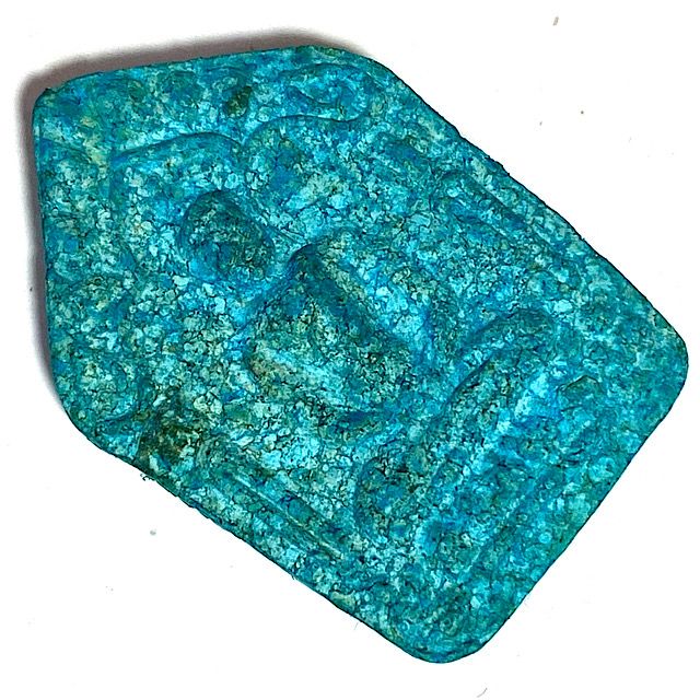 Left leaning 45 degree angle front face view of the amulet