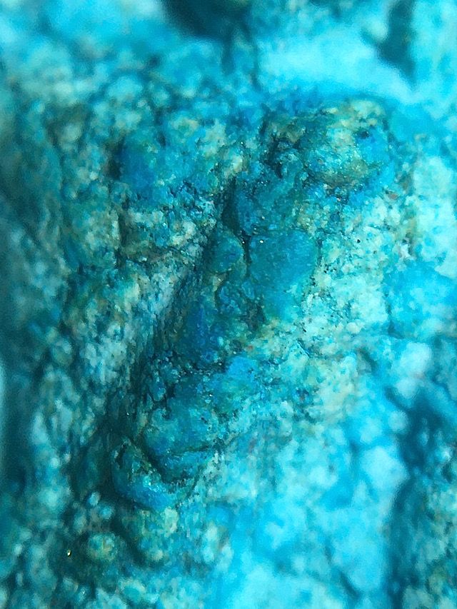 Macro close up image of the sacred clay features around the area of the pillar on the right side of the front edge