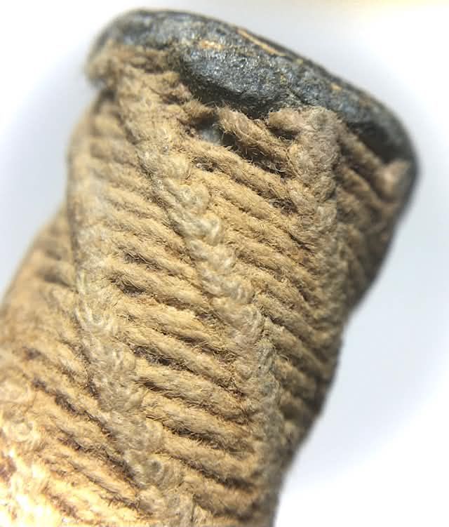 macro-close-up-of-takrut-lp-parn-wat-bang-nom-kho