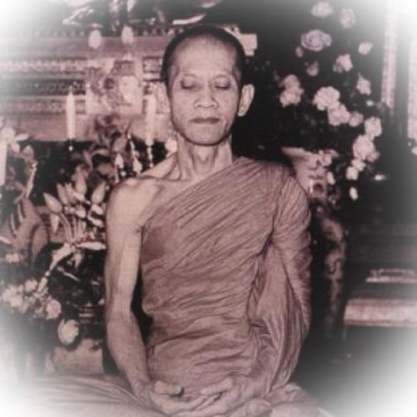 Jao Khun Nor seated in deep Meditation in the shrine room