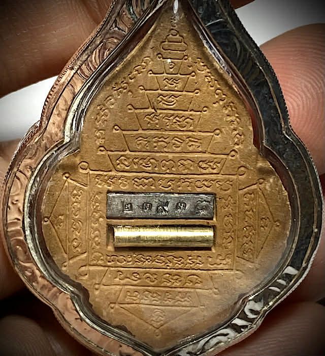 close up of The rear face of the amulet Pra Rahu Luang Pu Bun Ma