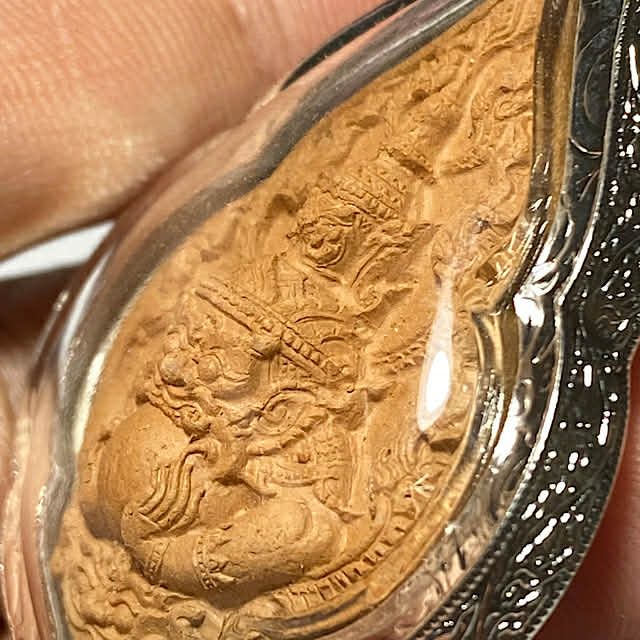 close up of The side front face of the amulet Pra Rahu Luang Pu Bun Ma