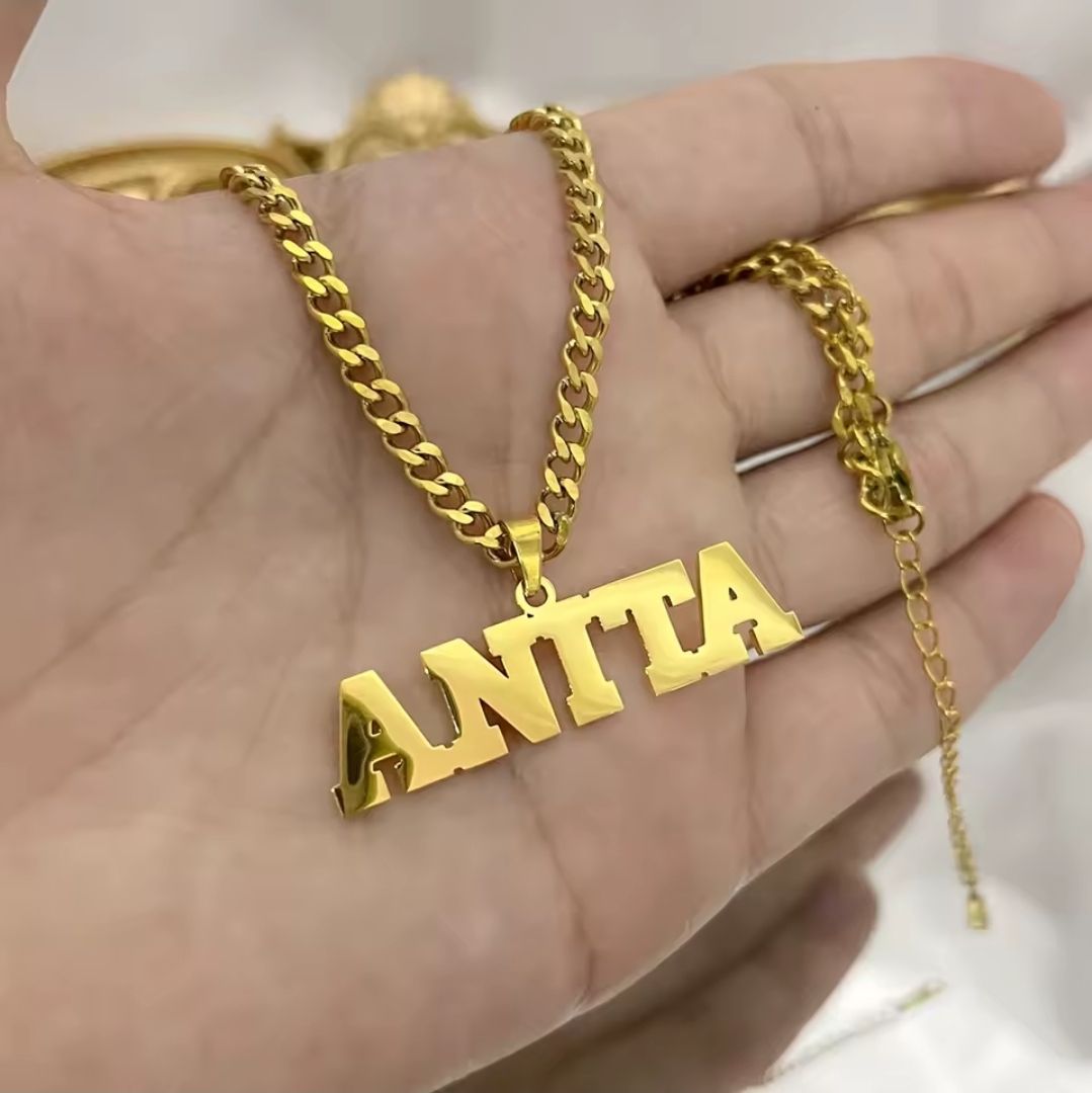Custom gold name necklace with Cuban chain, personalized pendant jewelry for men and women in Jamaica, gift-ready box.