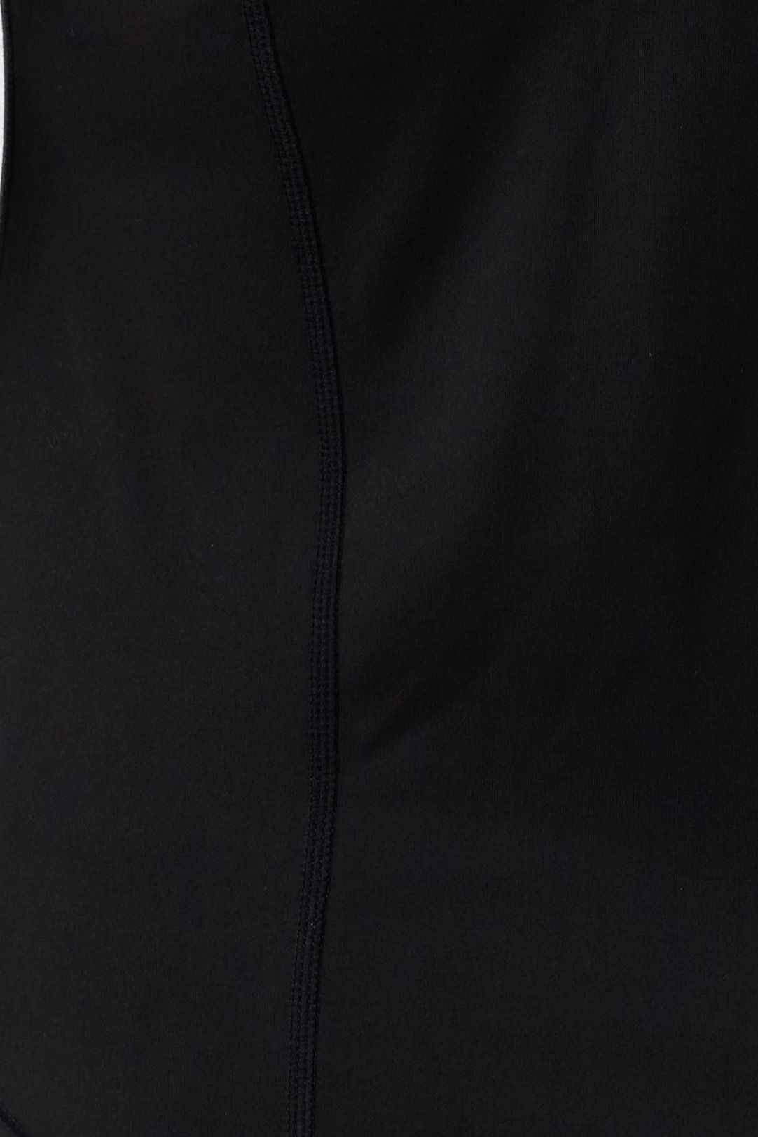 close up view of the stretchy black fabric
